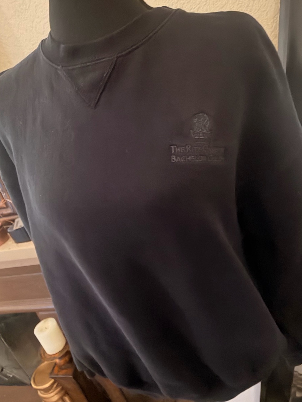 Men's Black Crewneck Sweater with Subtle Chest Emblem